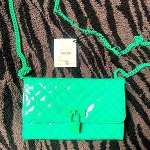 KURT GEIGER LONDON THATS A STRIKING TEAL COLOR WALLET W/ A DETACHABLE CHAIN NWT